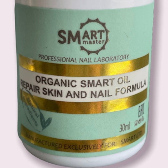 Close-up of SMART Organic Oil 30ml bottle, highlighting its natural ingredients for skin and nail health.