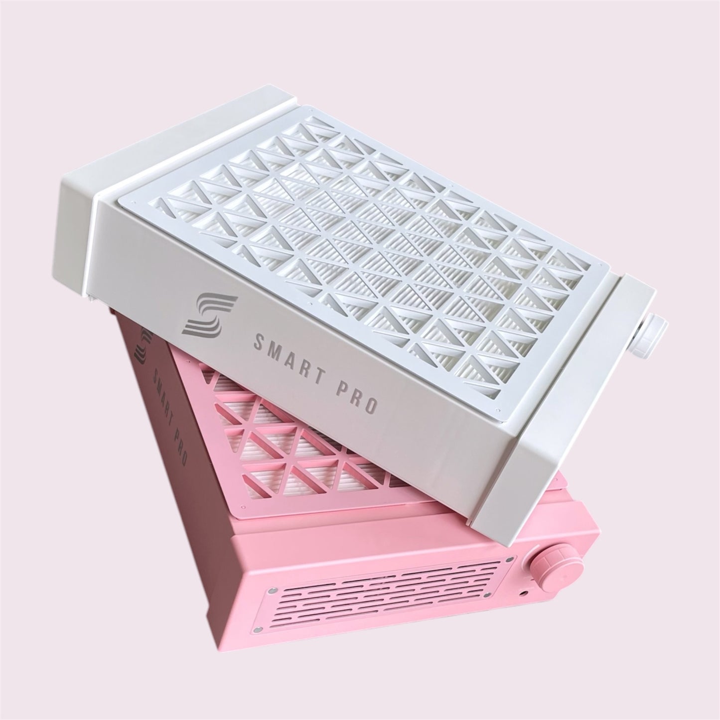 SMART PRO AIR Table-Top Nail Dust Collector in pink or white, complementing modern decor.