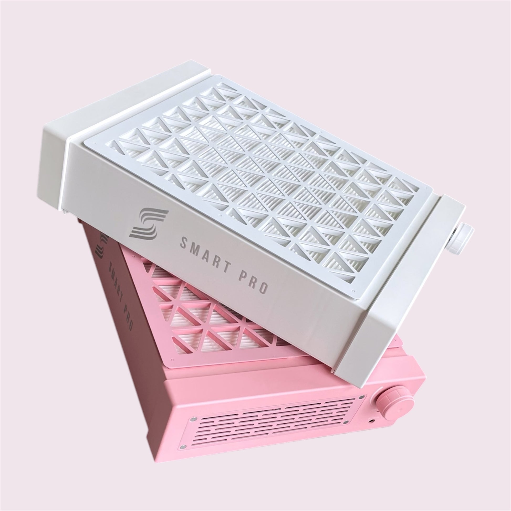 SMART PRO AIR Table-Top Nail Dust Collector in pink or white, complementing modern decor.